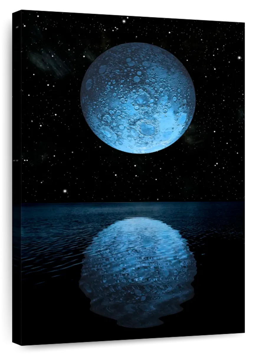 A Blue Moon Rising Over A Calm Ocean Wall Art