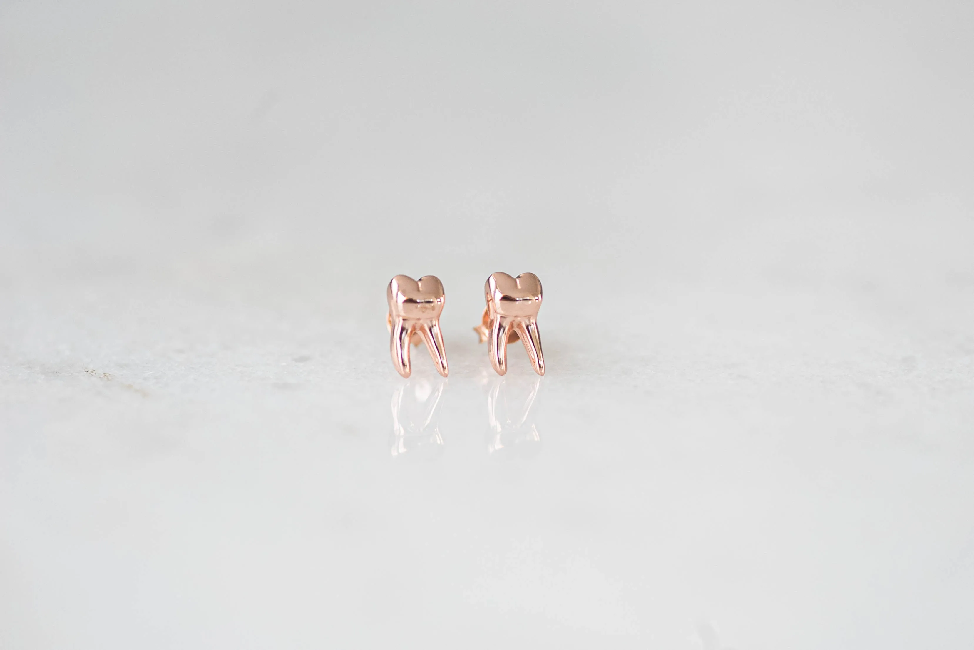 Tooth stud earrings